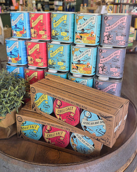 A selection of Funky Oumas Tims sitting on a wine barrel in Marthas's.