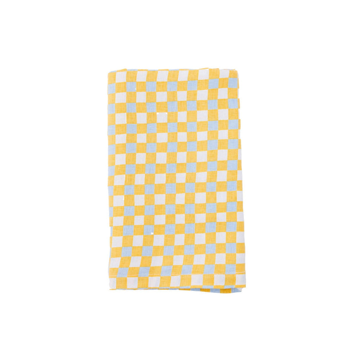 Yellow and blue check linen napkin shown flat on a white background