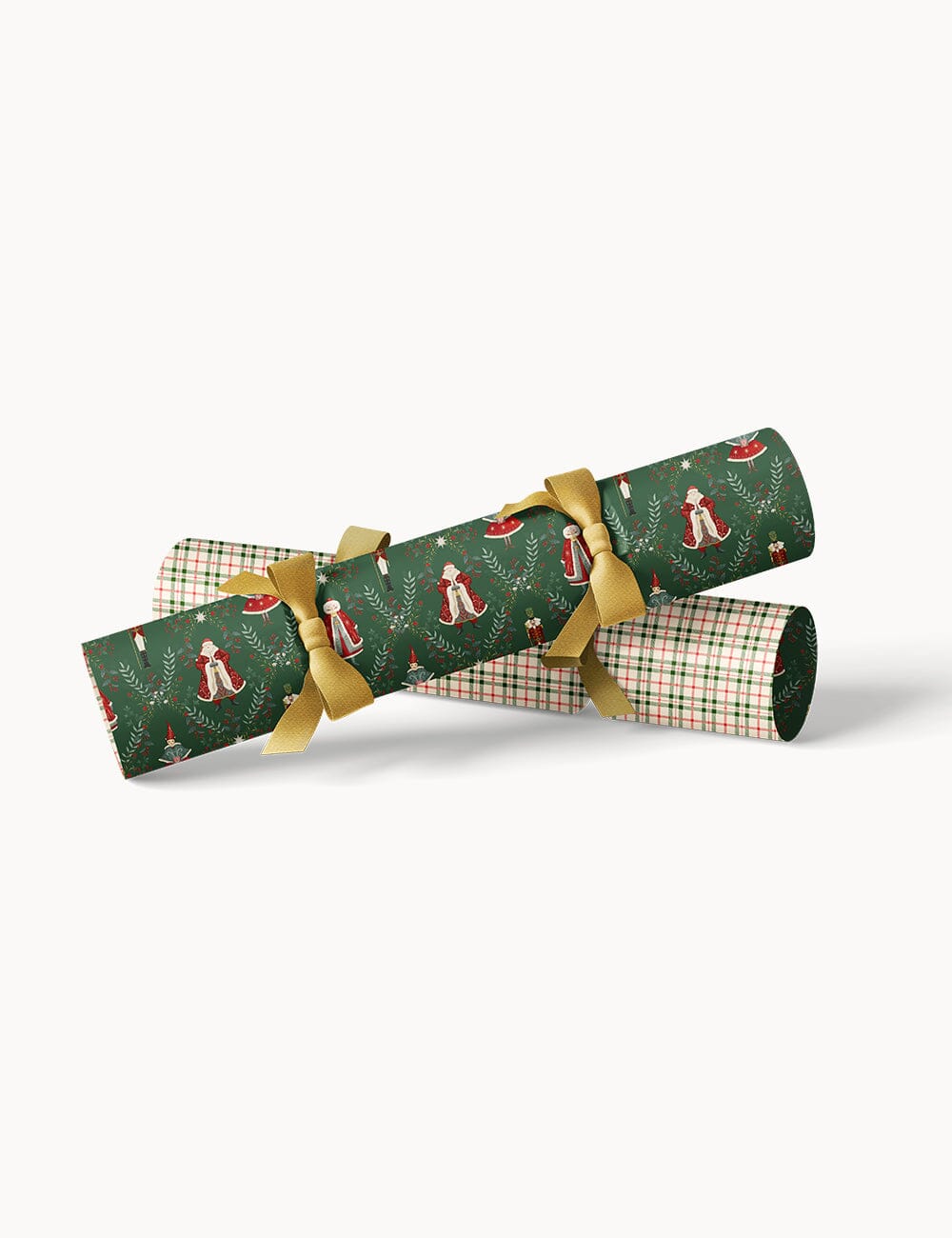 Christmas crackers with gold ribbons on a white background
