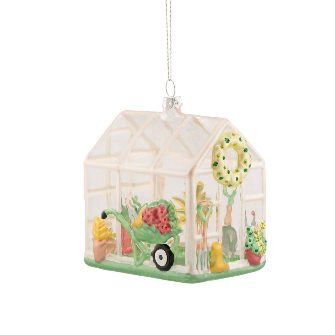 Decorative ornament of a greenhouse with gardening elements on a white background