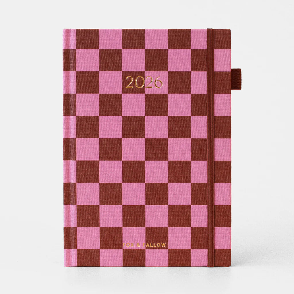 Checkered planner with pink and brown pattern and '2026' on a white background