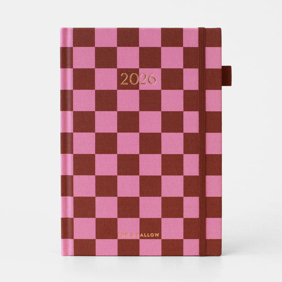 Checkered planner with pink and brown pattern and '2026' on a white background