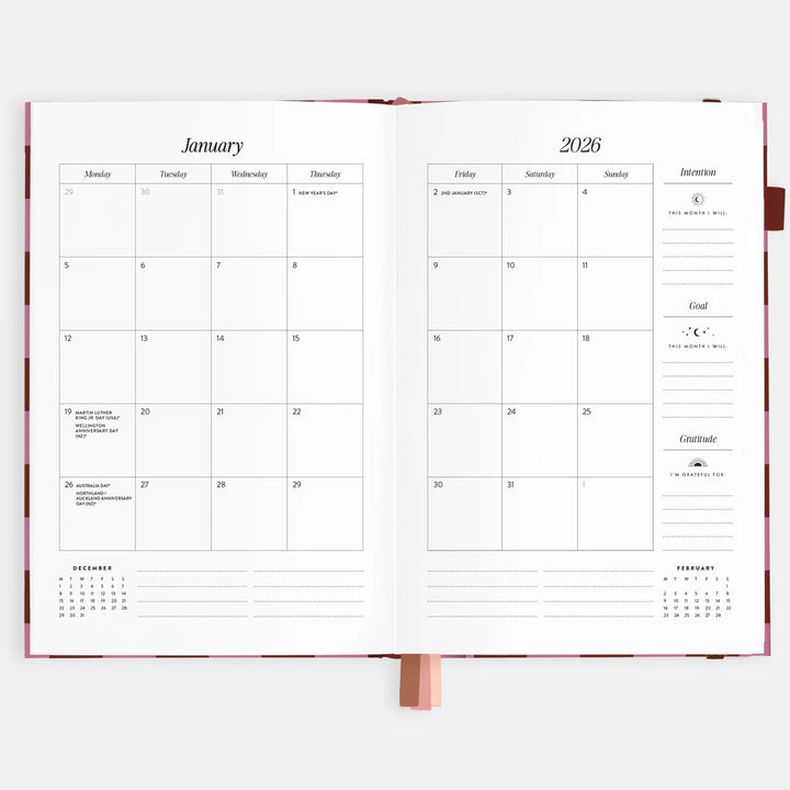 Open planner showing January 2026 calendar on a white background