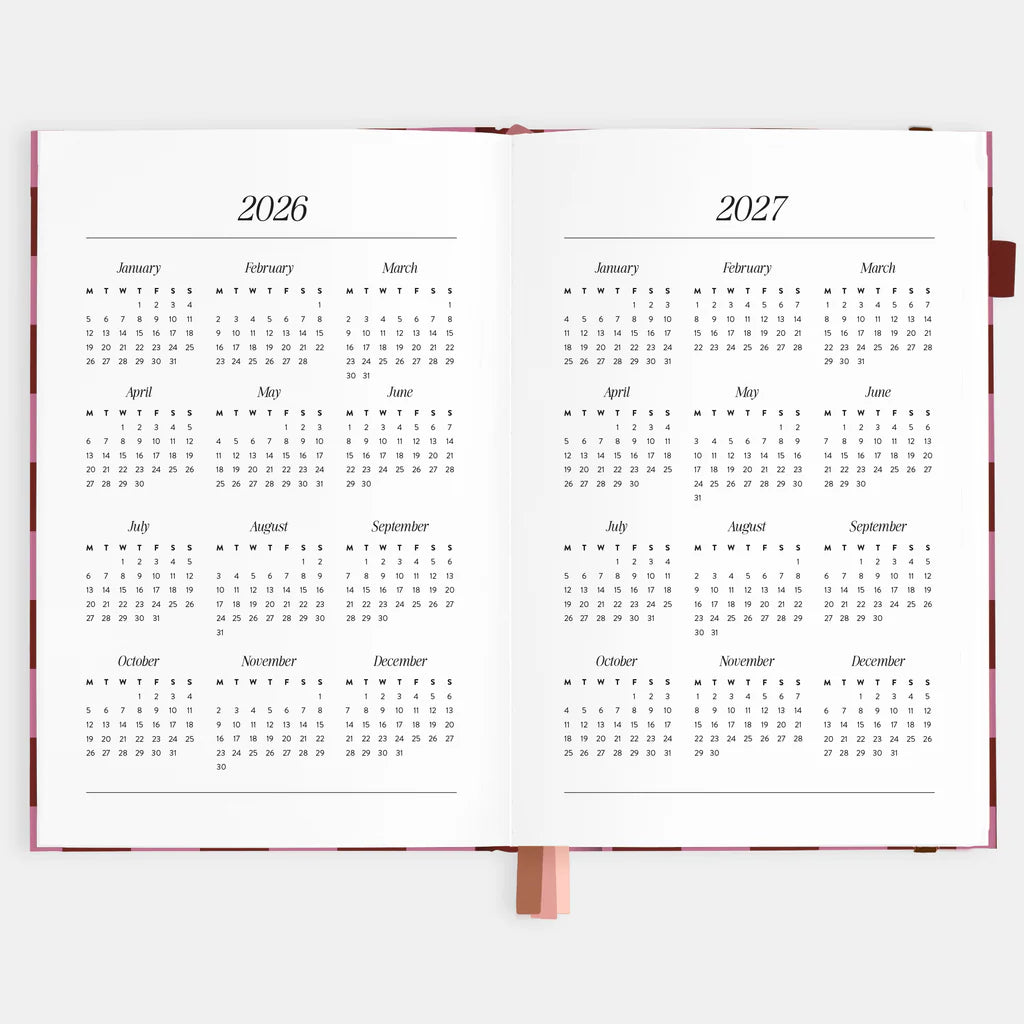 Calendar open to pages showing years 2026 and 2027 on a white background