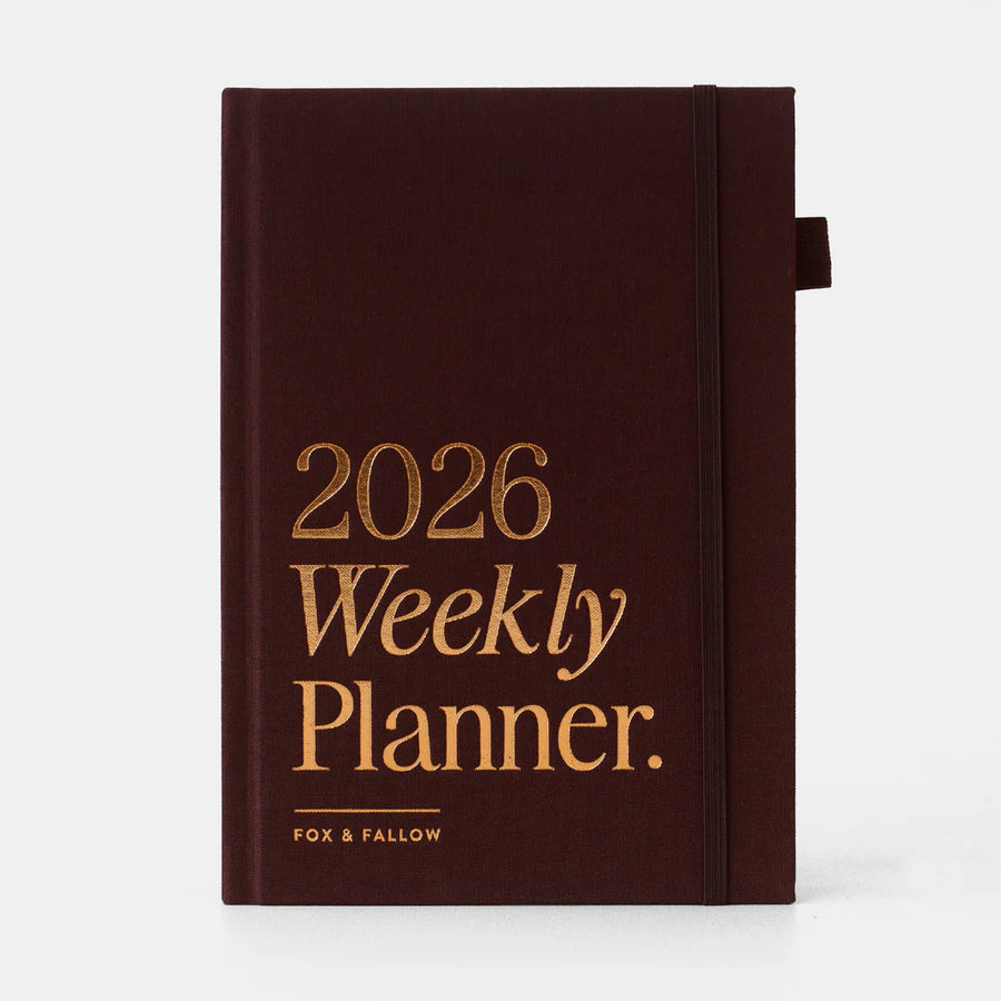 Brown planner with '2026 Weekly Planner' text on a white background