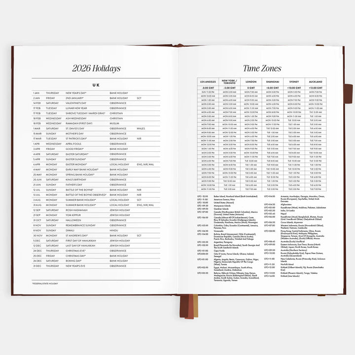 Open book displaying a table of 2026 holidays and time zones on a white background.