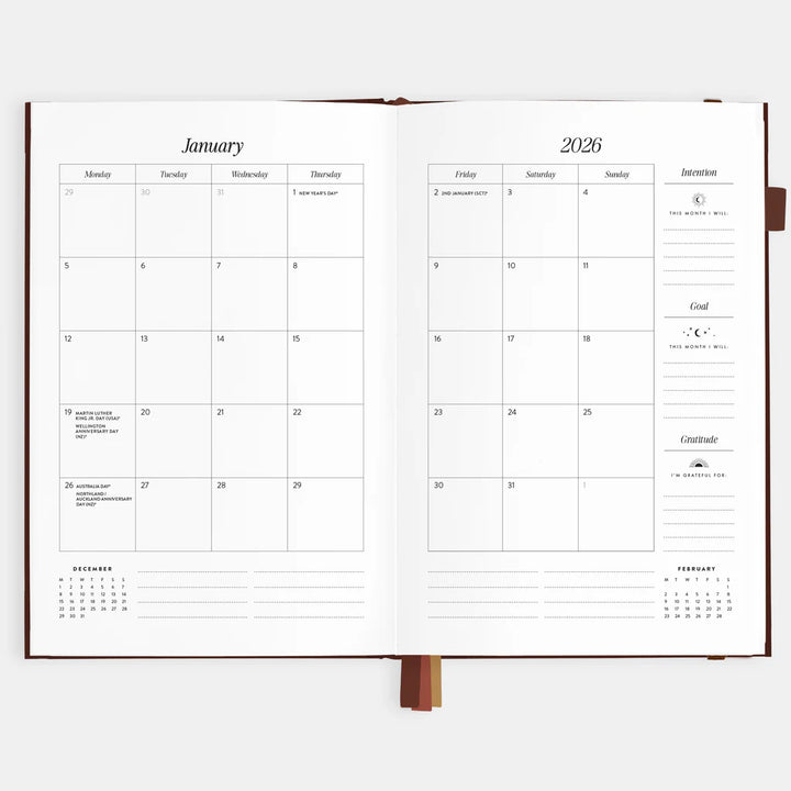 Open planner showing a calendar page for January 2026 on a white background