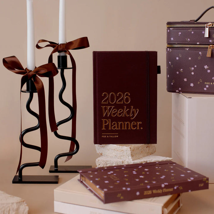 2026 Weekly Planner with decorative candle holder and matching box on a neutral background