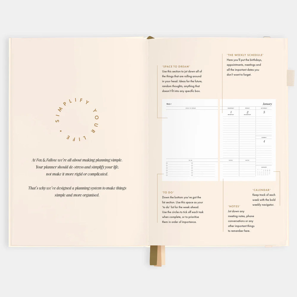 Open planner with text and scheduling layout on a white background