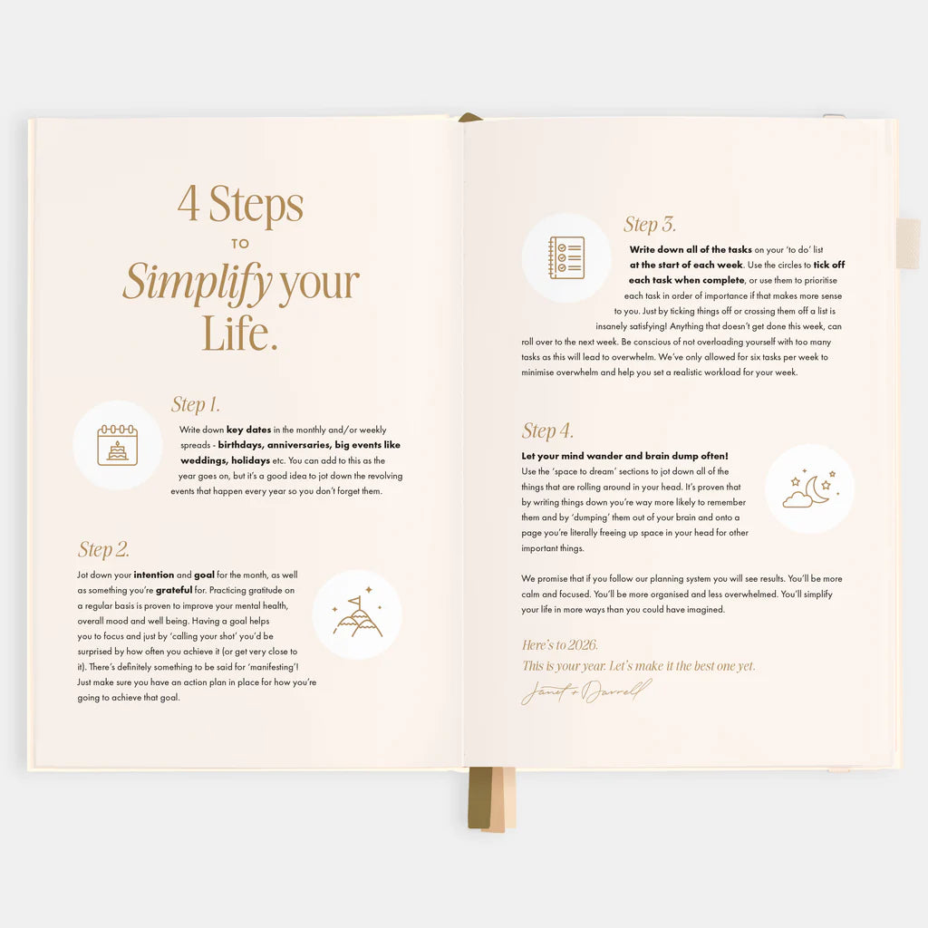 Open book with steps to simplify your life on a light gray background