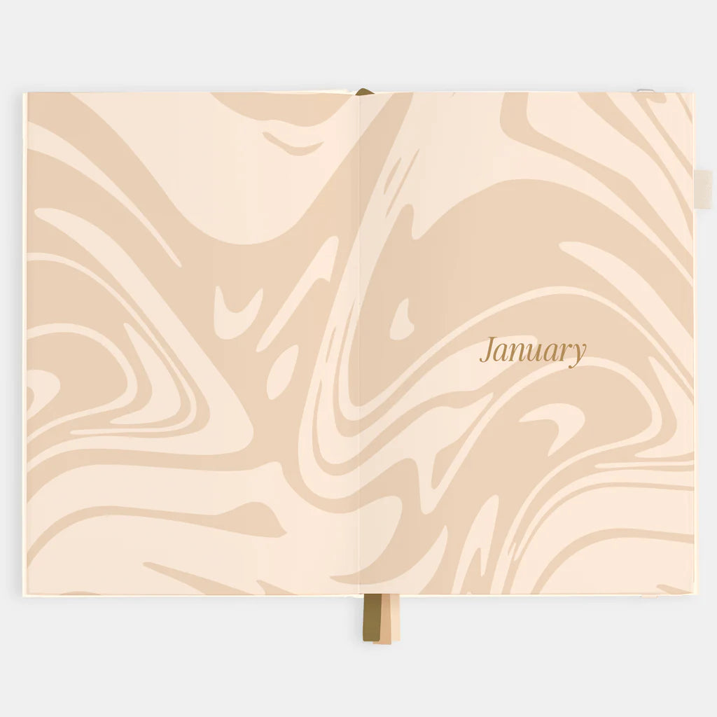Calendar with beige marble design and 'January' text on a light gray background