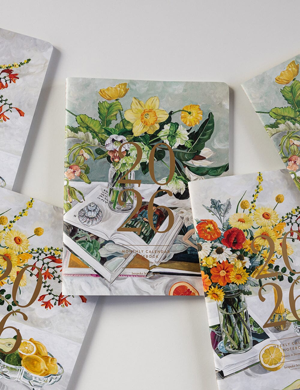 Decorative calendar with floral and vintage design on a white surface