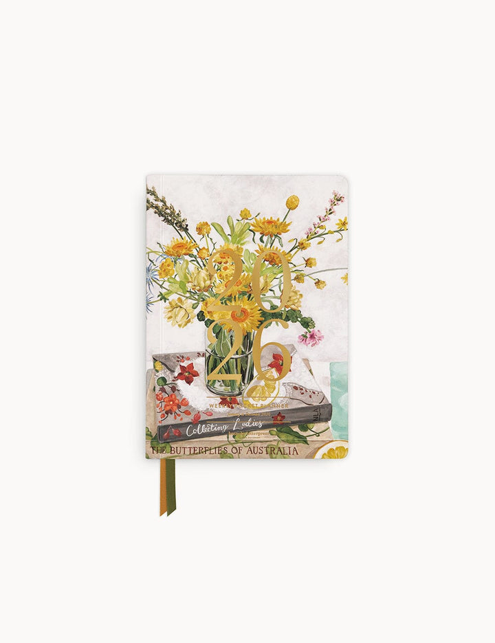 Planner with floral design on the cover against a white background