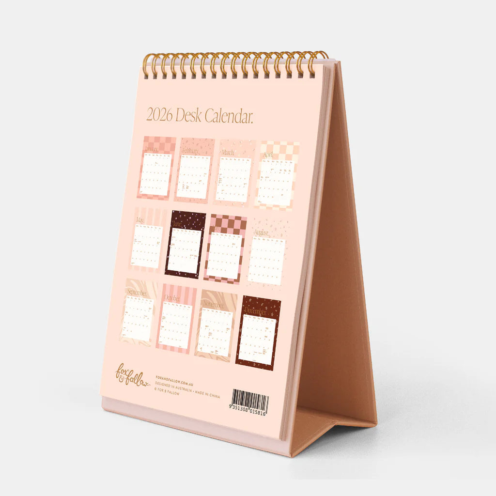 2026 desk calendar with a stand on a white background