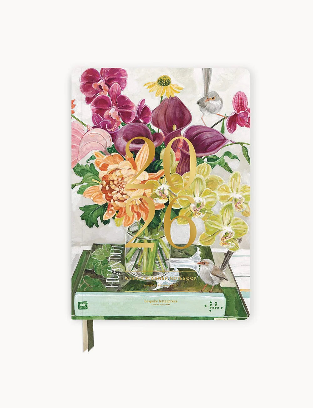 Notebook with floral design on the cover on a white background