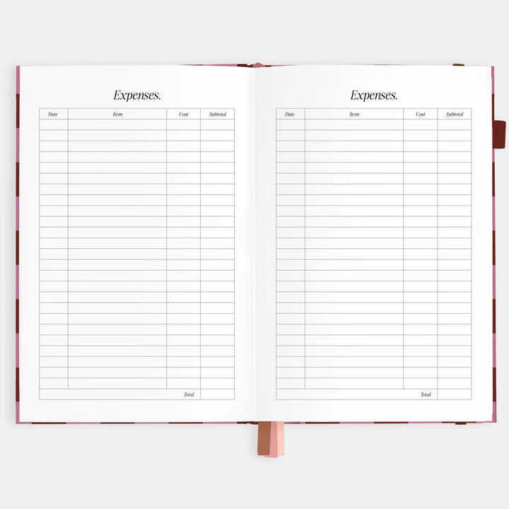 Expense tracking pages in a notebook on a white background