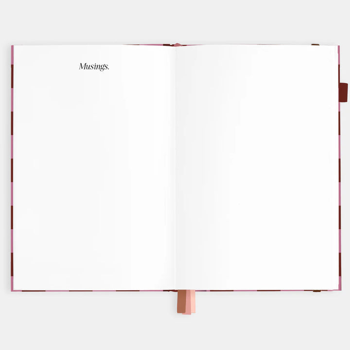 Open book with 'Musings' on a white background