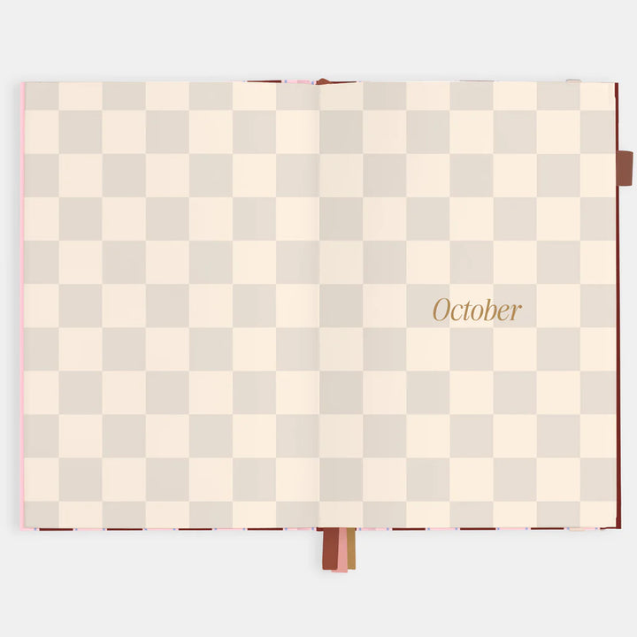 Checkered calendar with 'October' text on a light background