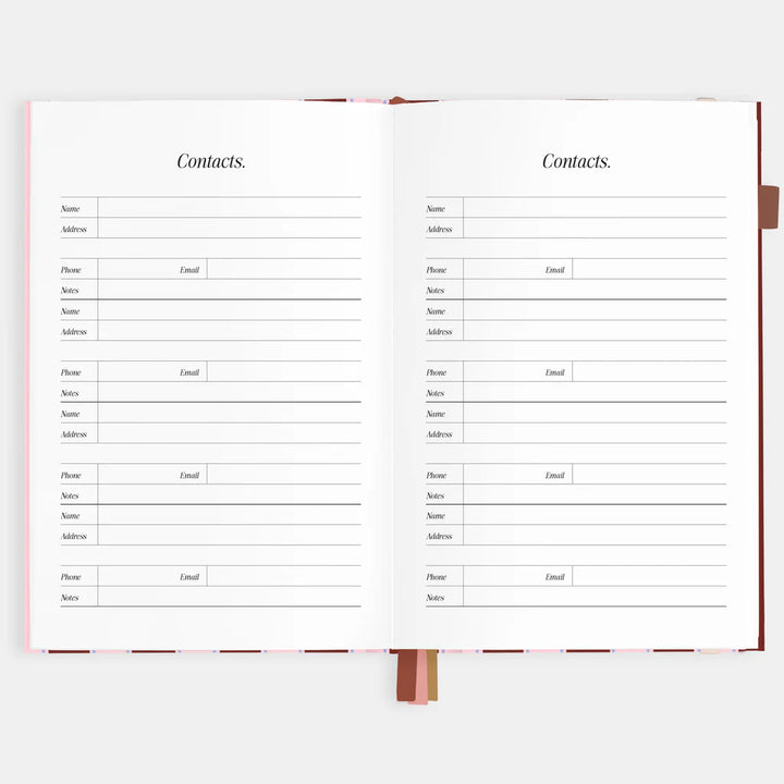 Open book showing a contacts page with columns for Name, Address, Phone, and Email.