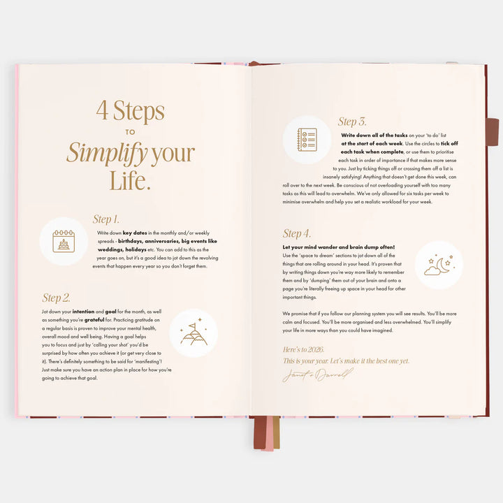 Open book with steps to simplify your life on a light gray background