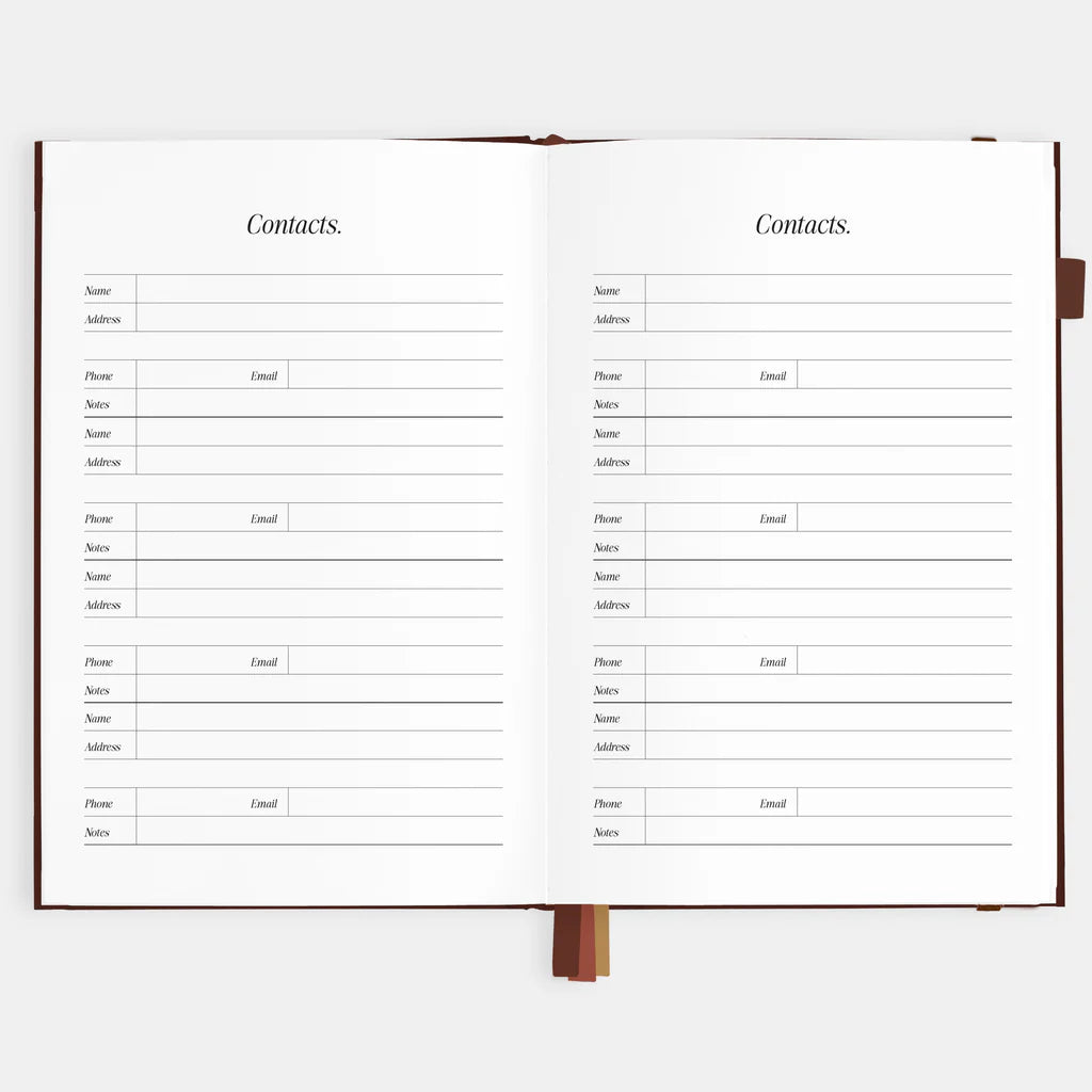 Open notebook with contact list pages on a white background