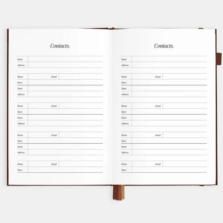 Open notebook with contact list pages on a white background
