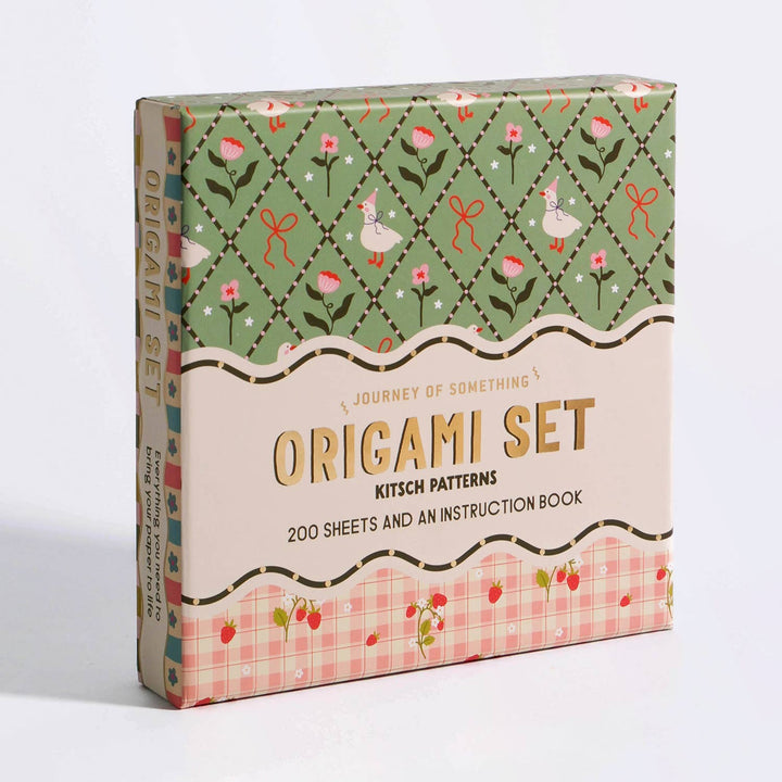 Origami set packaging with floral and geometric patterns on a white background