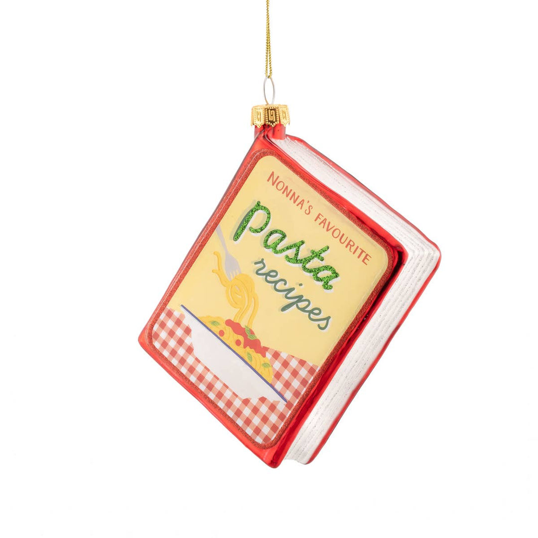 Decorative ornament shaped like a cookbook titled &