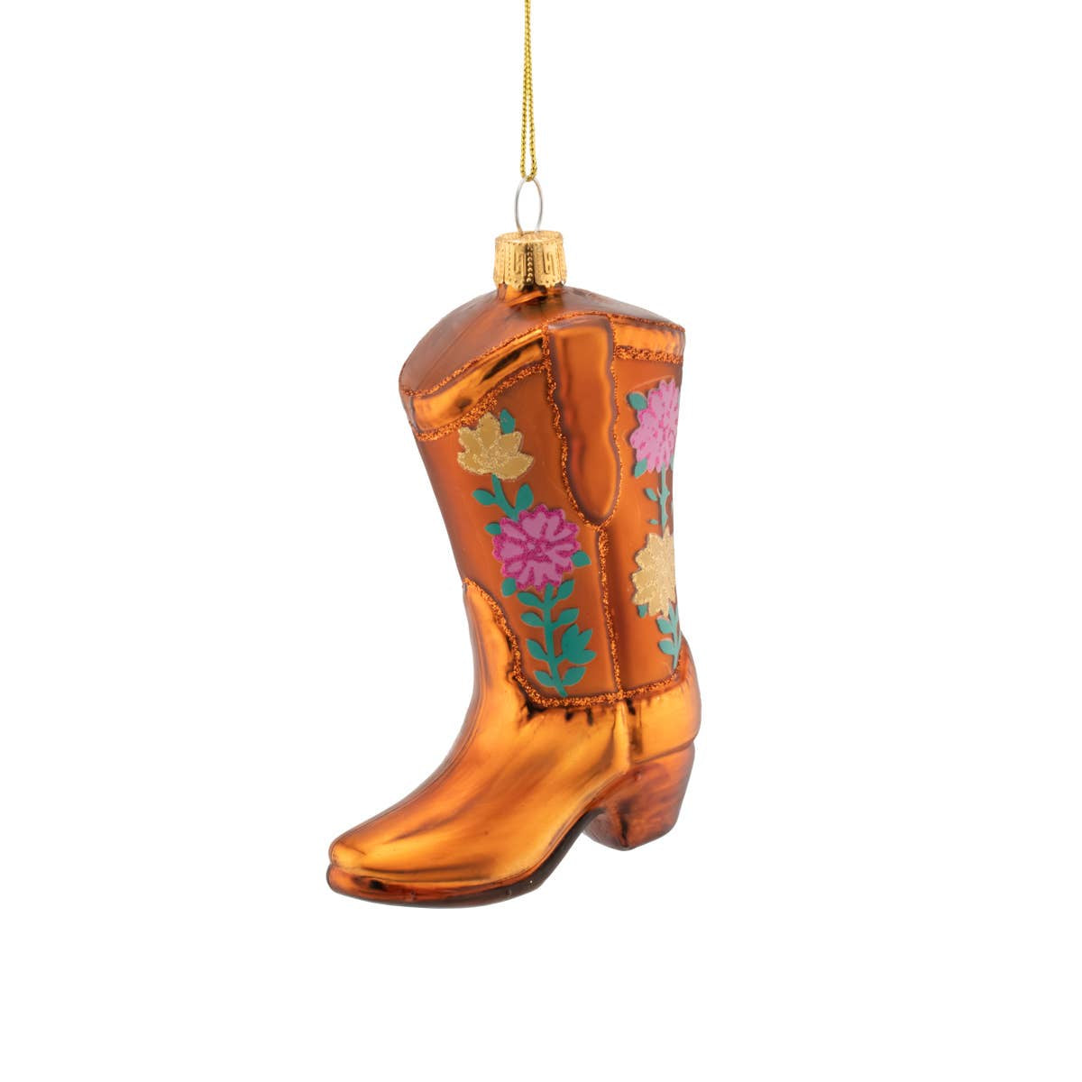 Decorative glass cowboy boot ornament with floral designs on a white background