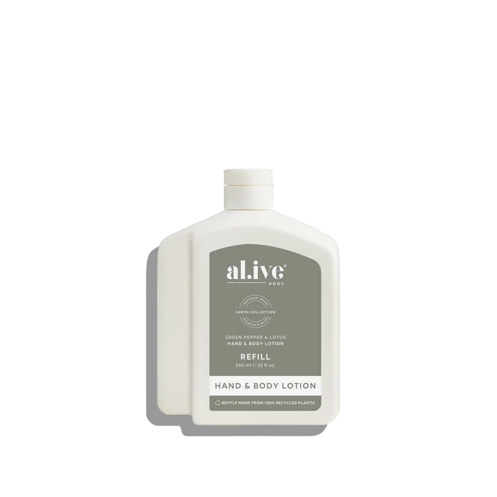 White bottle of al.ive hand and body lotion on a white background