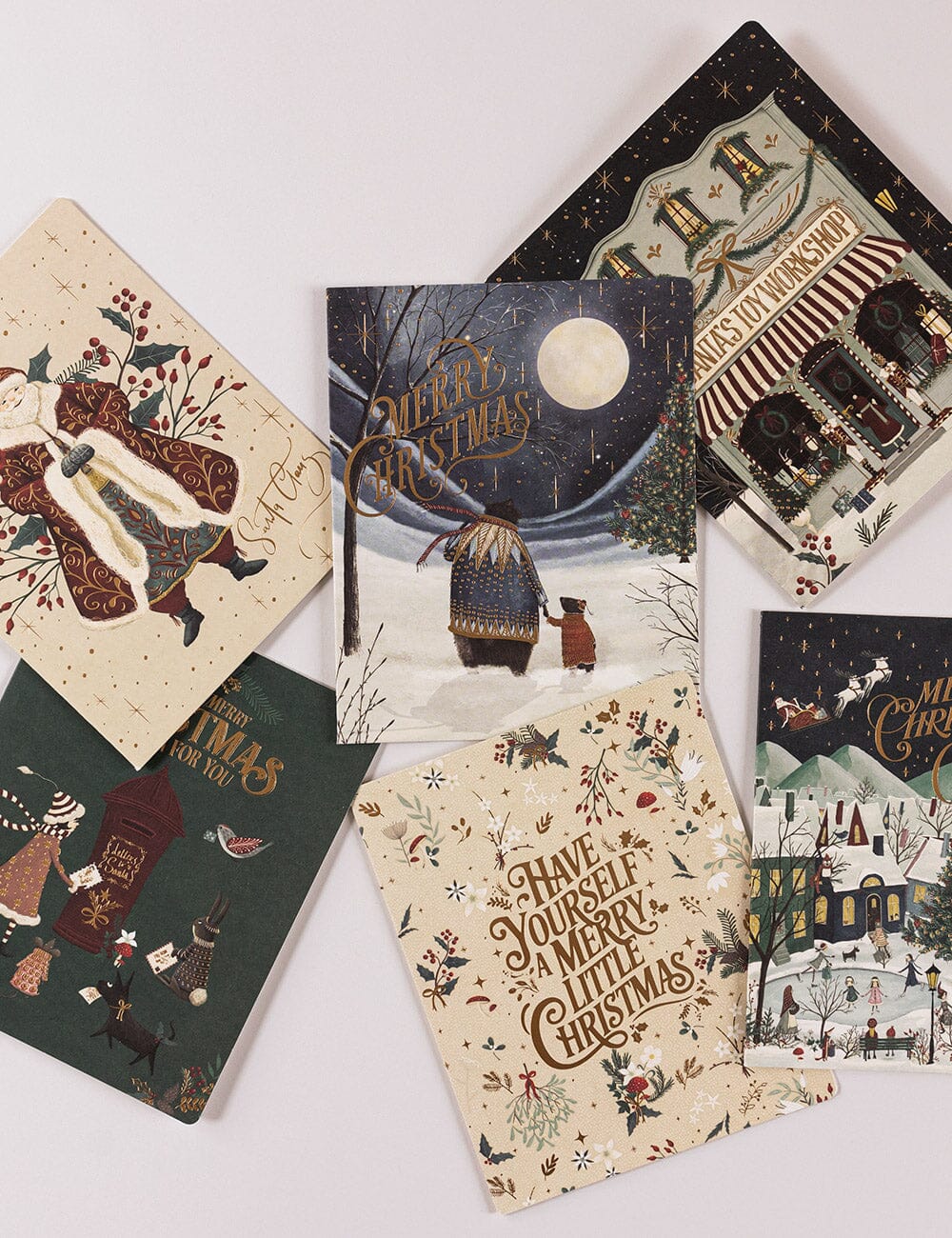 Collection of Christmas-themed greeting cards on a white background