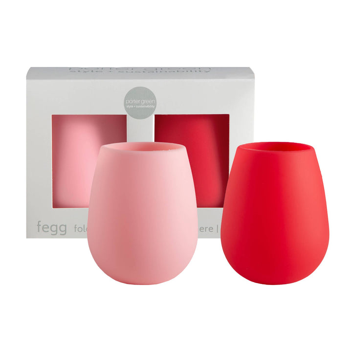Two pink and red tumblers with a packaging box in the background.