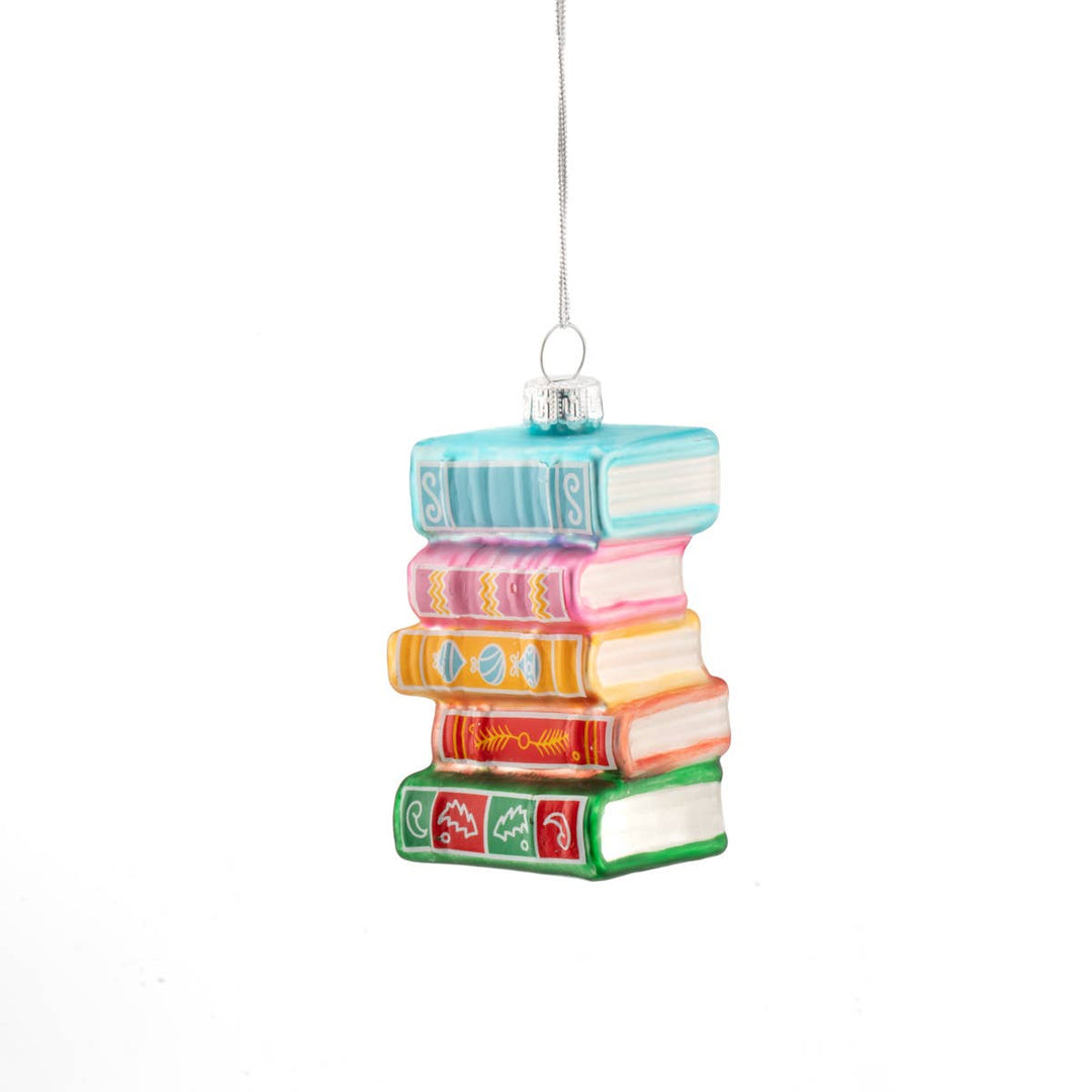Colorful stack of books Christmas ornament on a white background