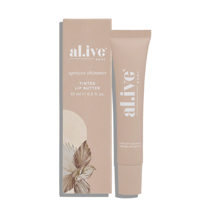 Tinted lip butter with packaging on a white background