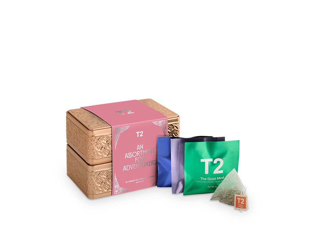 T2 tea packaging including a box and bags on a white background