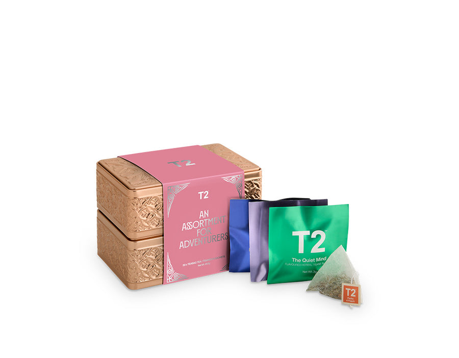 T2 tea packaging including a box and bags on a white background