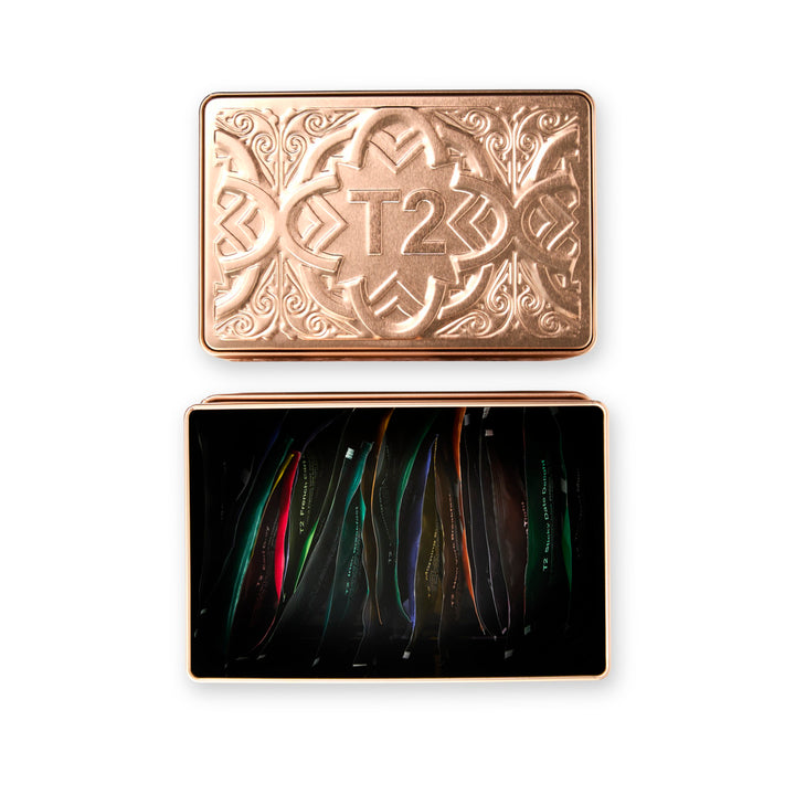 Decorative gold case with 'T2' branding on a white background