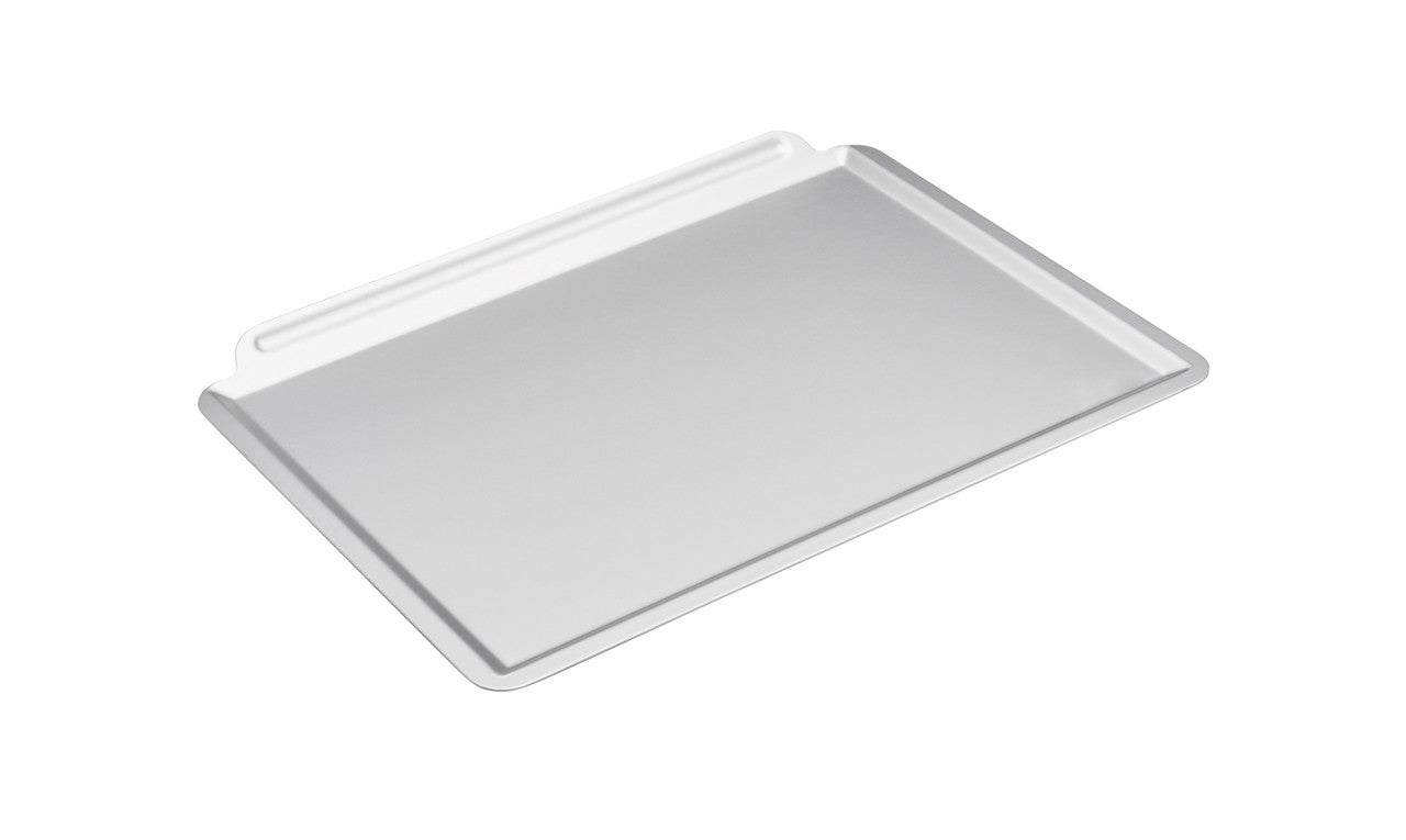 Metal baking tray on a white background