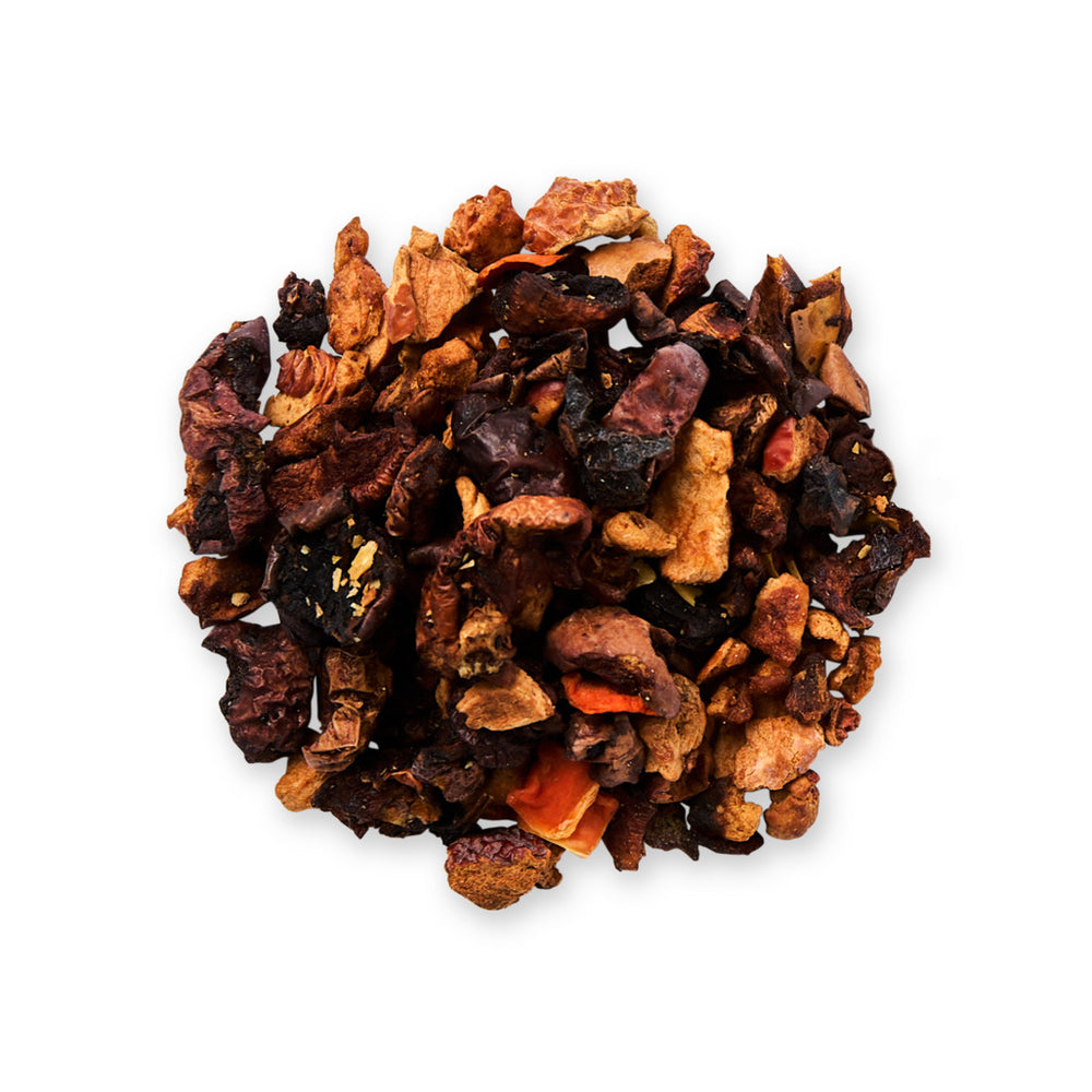 Heap of dried fruit pieces on a white background