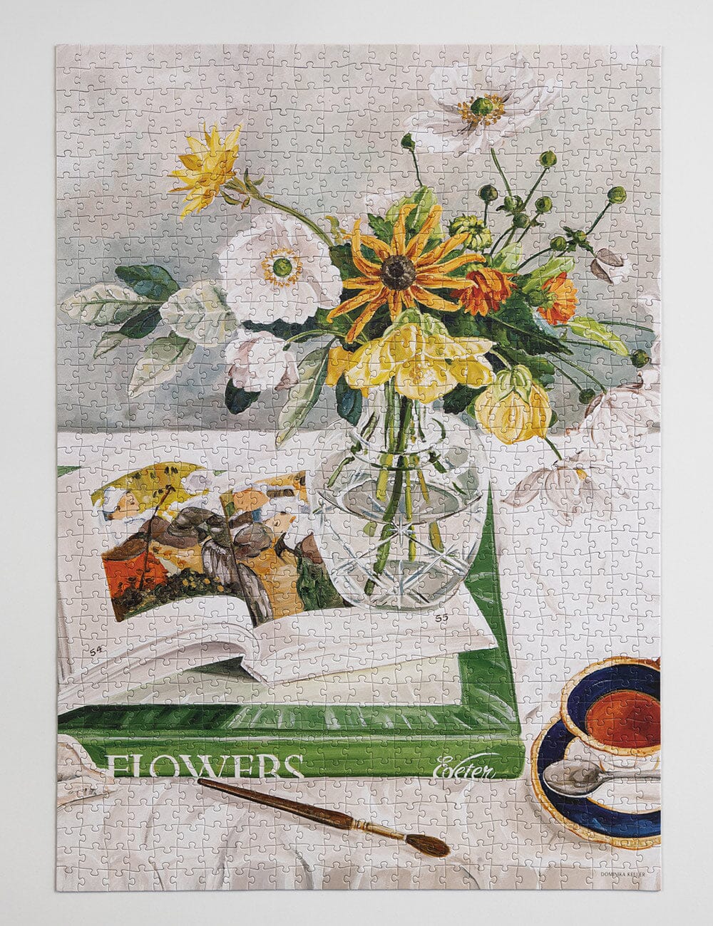 Jigsaw puzzle with a floral design and text on a white background