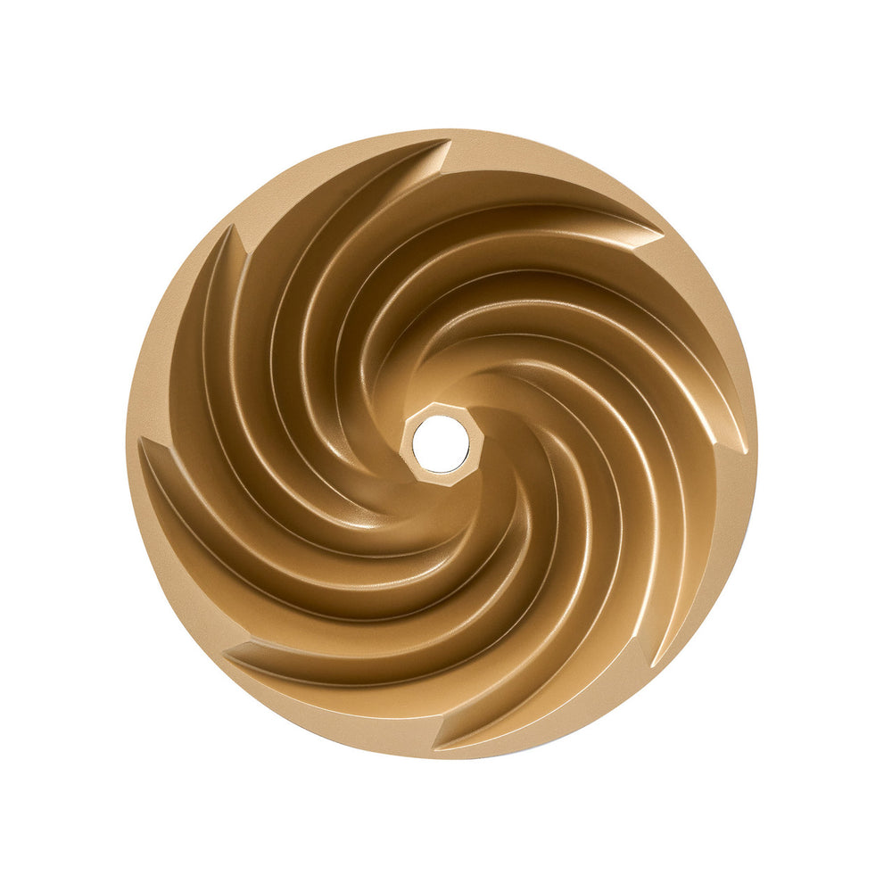 Gold cake tin on a white background