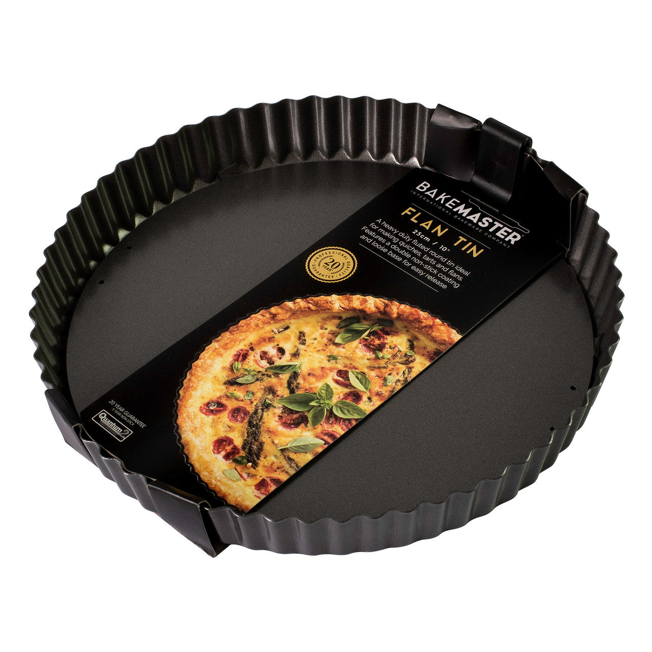 Black flan tin with a baked dish on the packaging on a white background