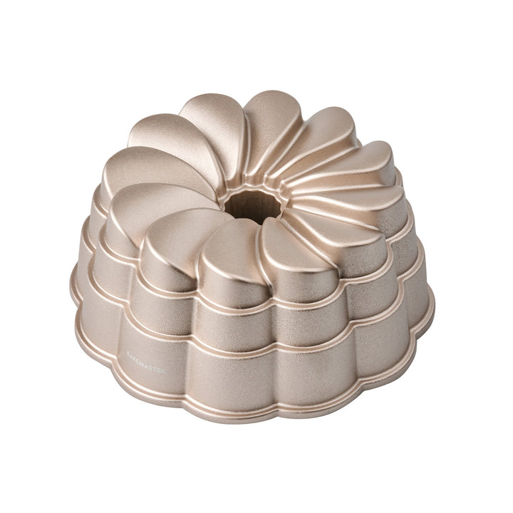 Bundt cake pan on a white background