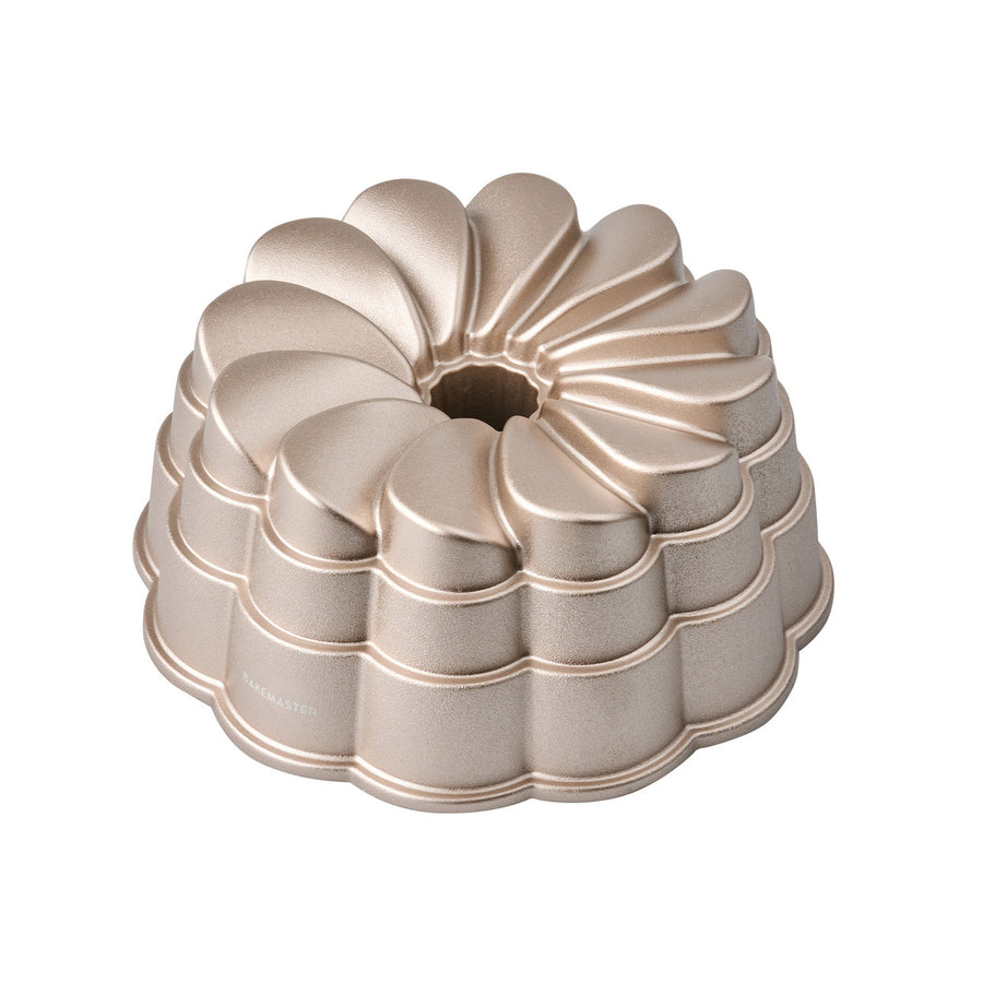Bundt cake pan on a white background