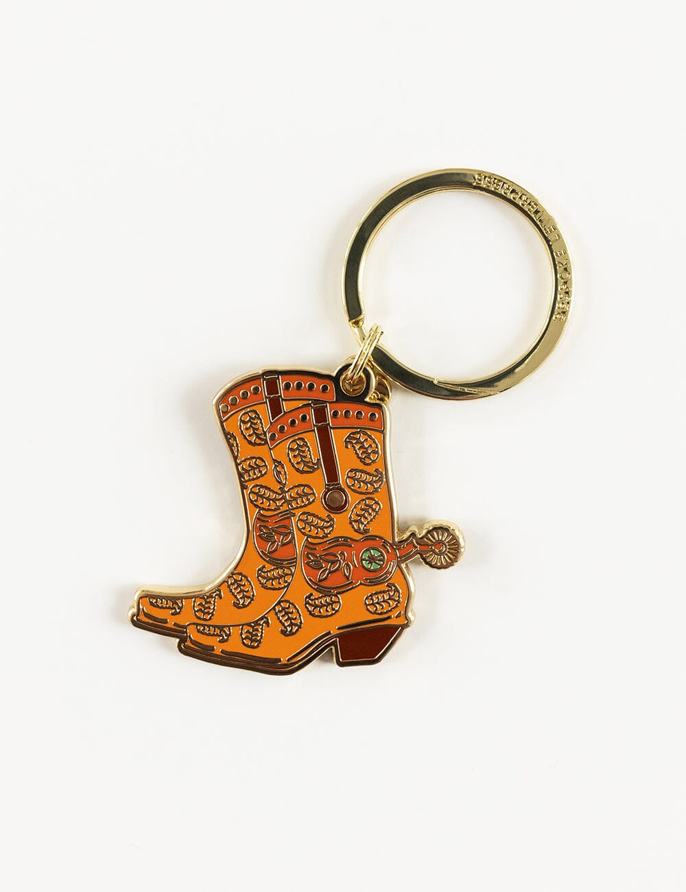 Keychain with cowgirl boot design on a white background