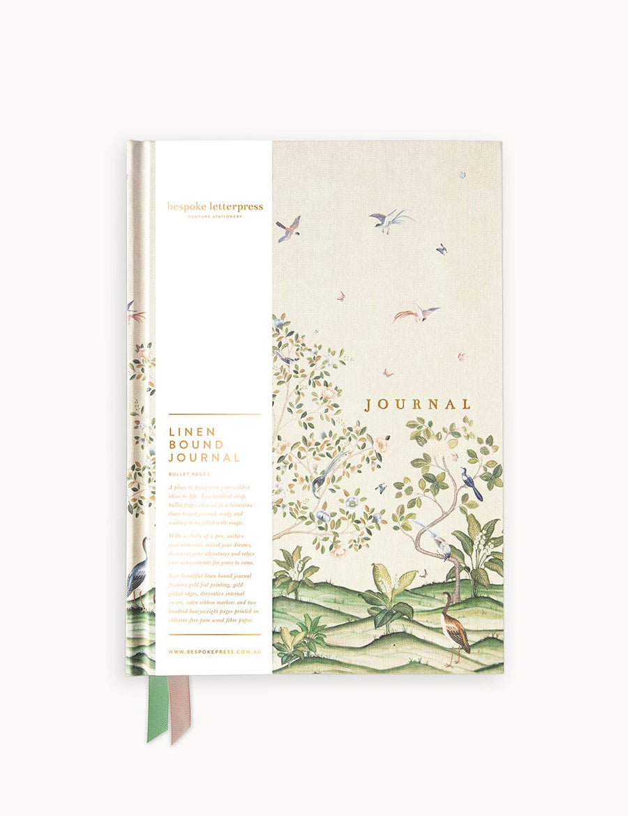 Journal with nature-themed design on a white background
