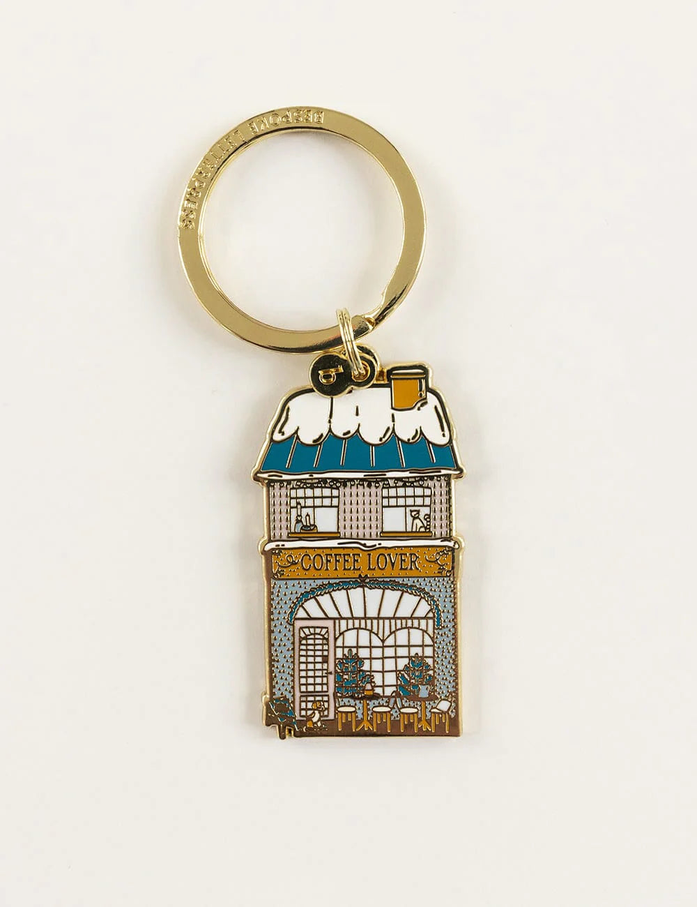 Keychain shaped like a coffee shop with 'Coffee Lover' text on a white background