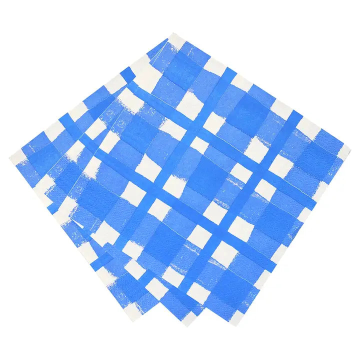 Set of blue and white checkered napkins on a white background