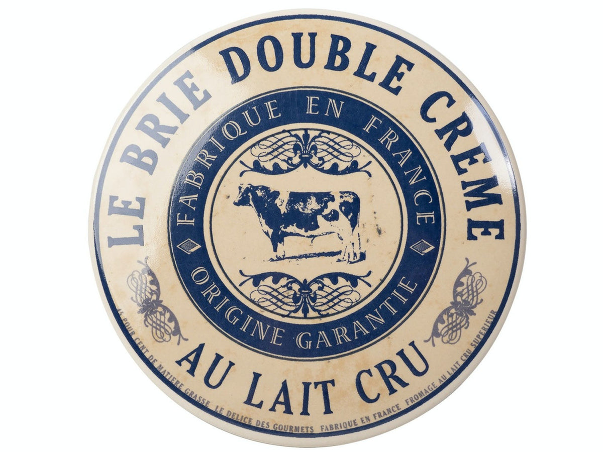 Round cheese baker with 'Le Brie Double Crème' branding on a beige background