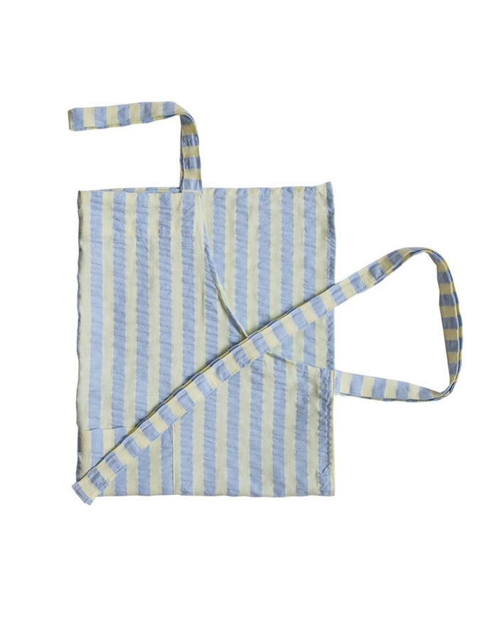 Striped apron with blue and cream pattern on a white background